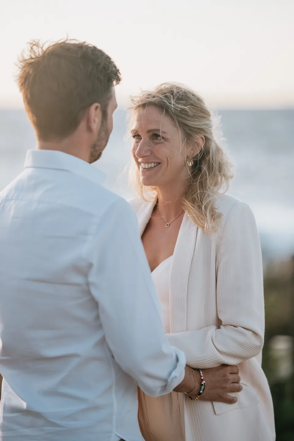 A couple embracing in golden light
