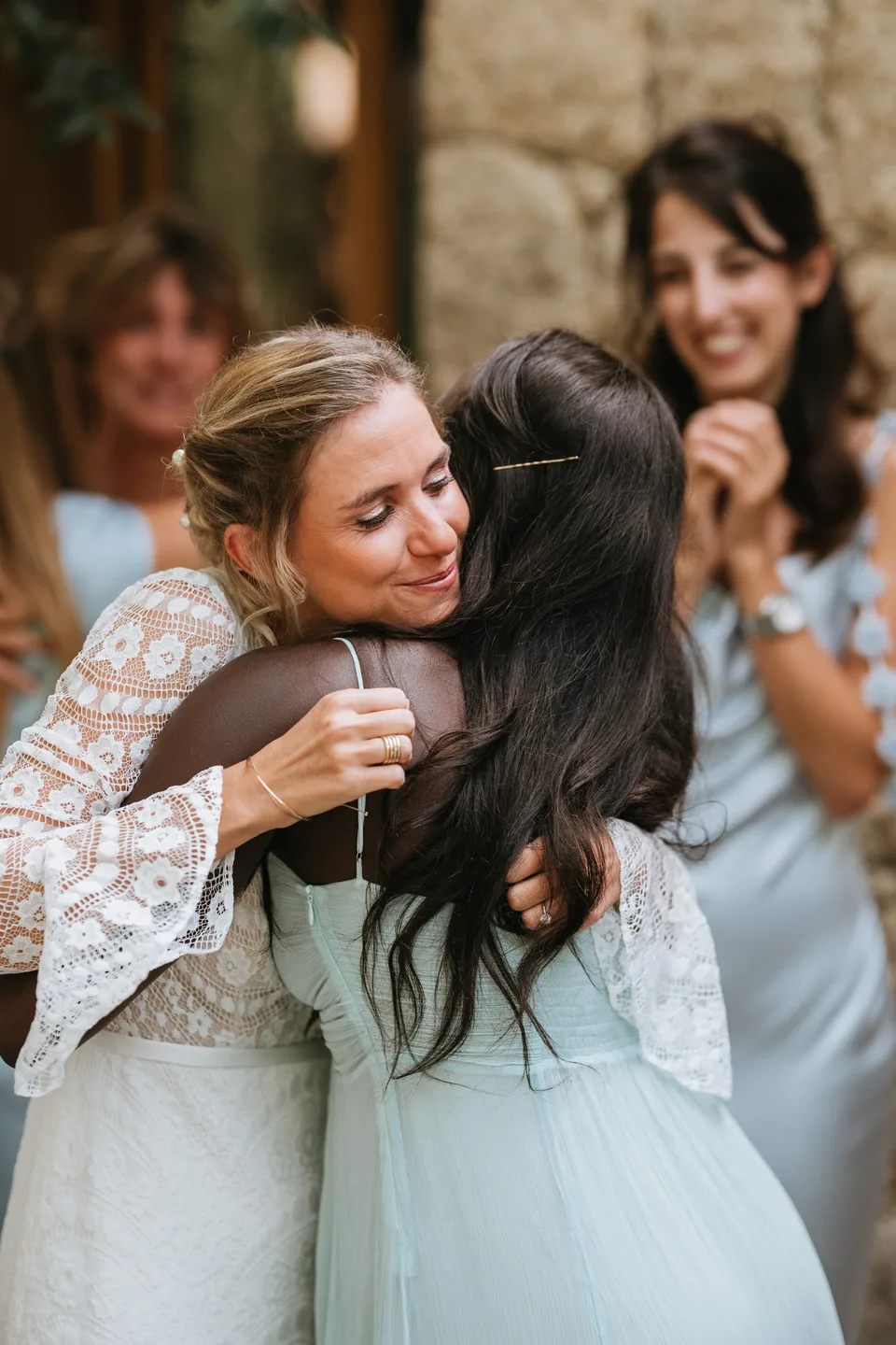An emotional embrace with the bride