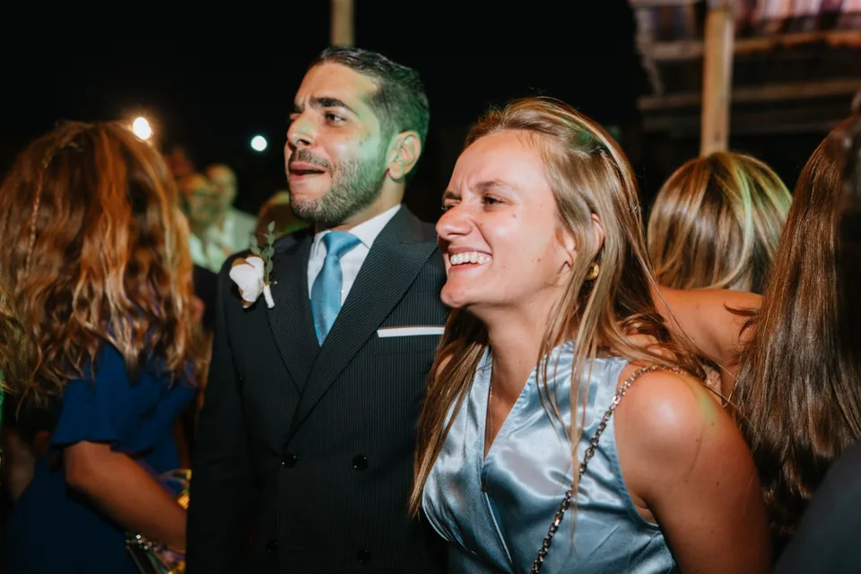 Guests sharing smiles during the party