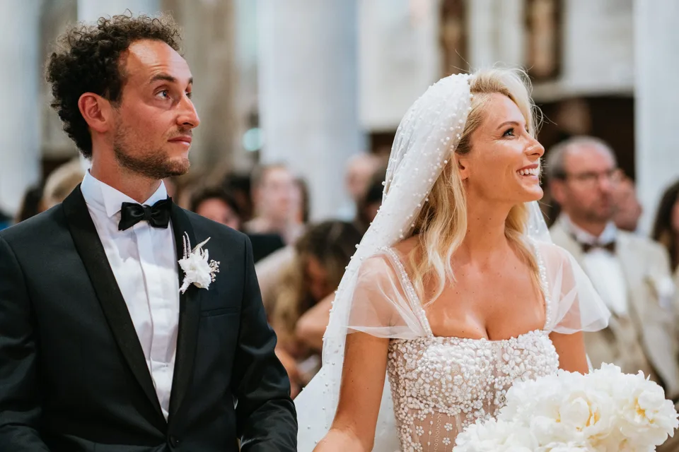 Newlyweds smiling during the ceremony