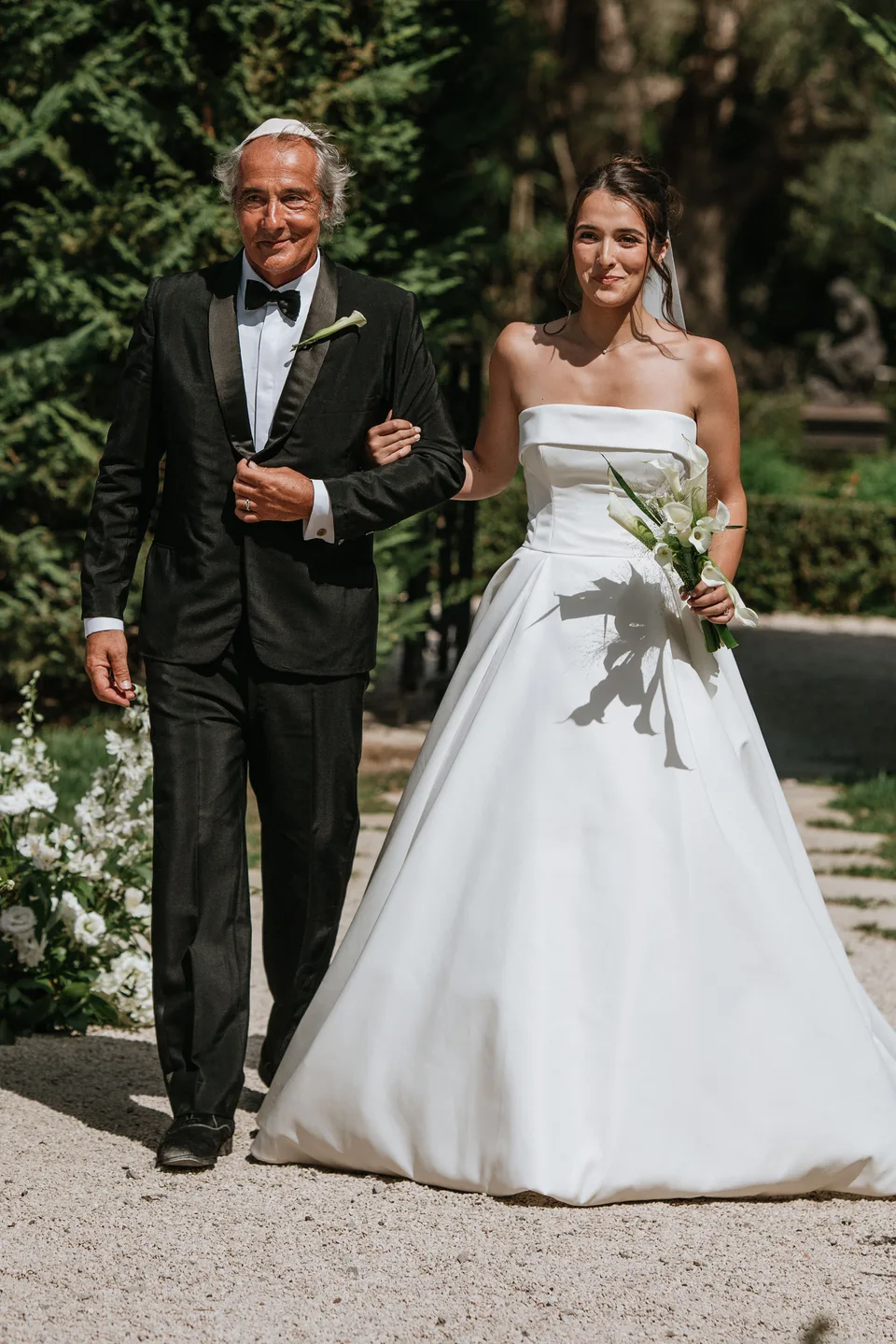 Newlyweds walking hand in hand