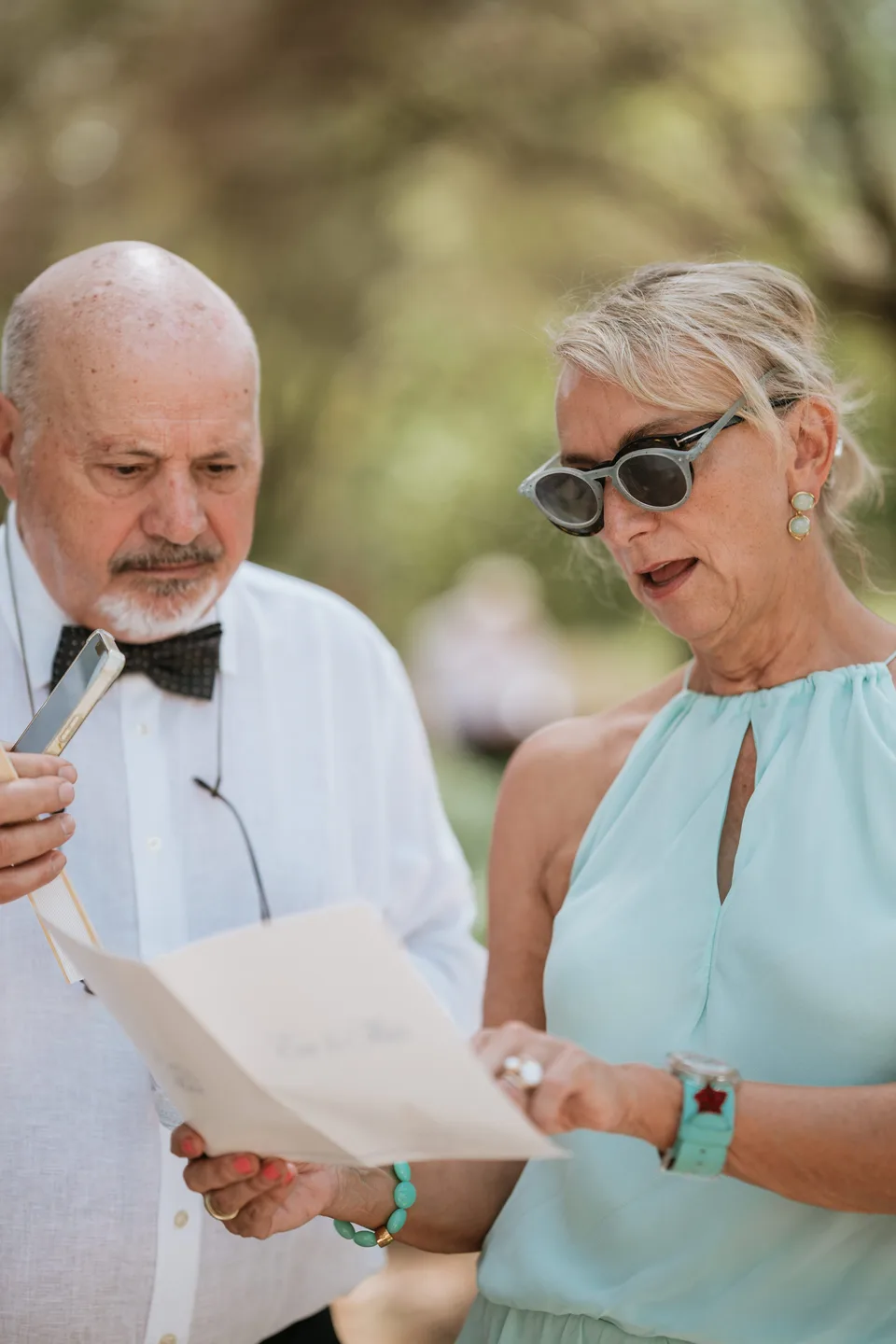 Two guests talking over drinks