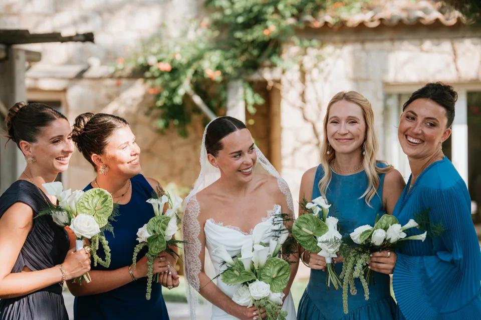 The bride and guests holding their bouquets