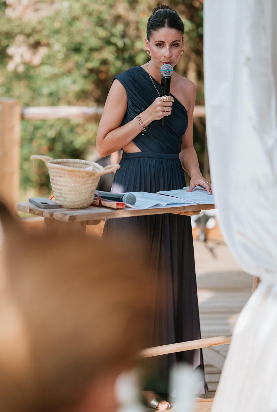 A guest reading a speech to the newlyweds