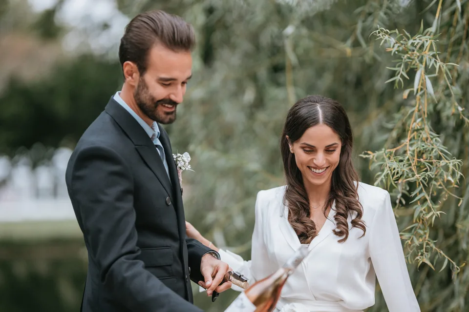 Newlyweds smiling over their ceremony readings