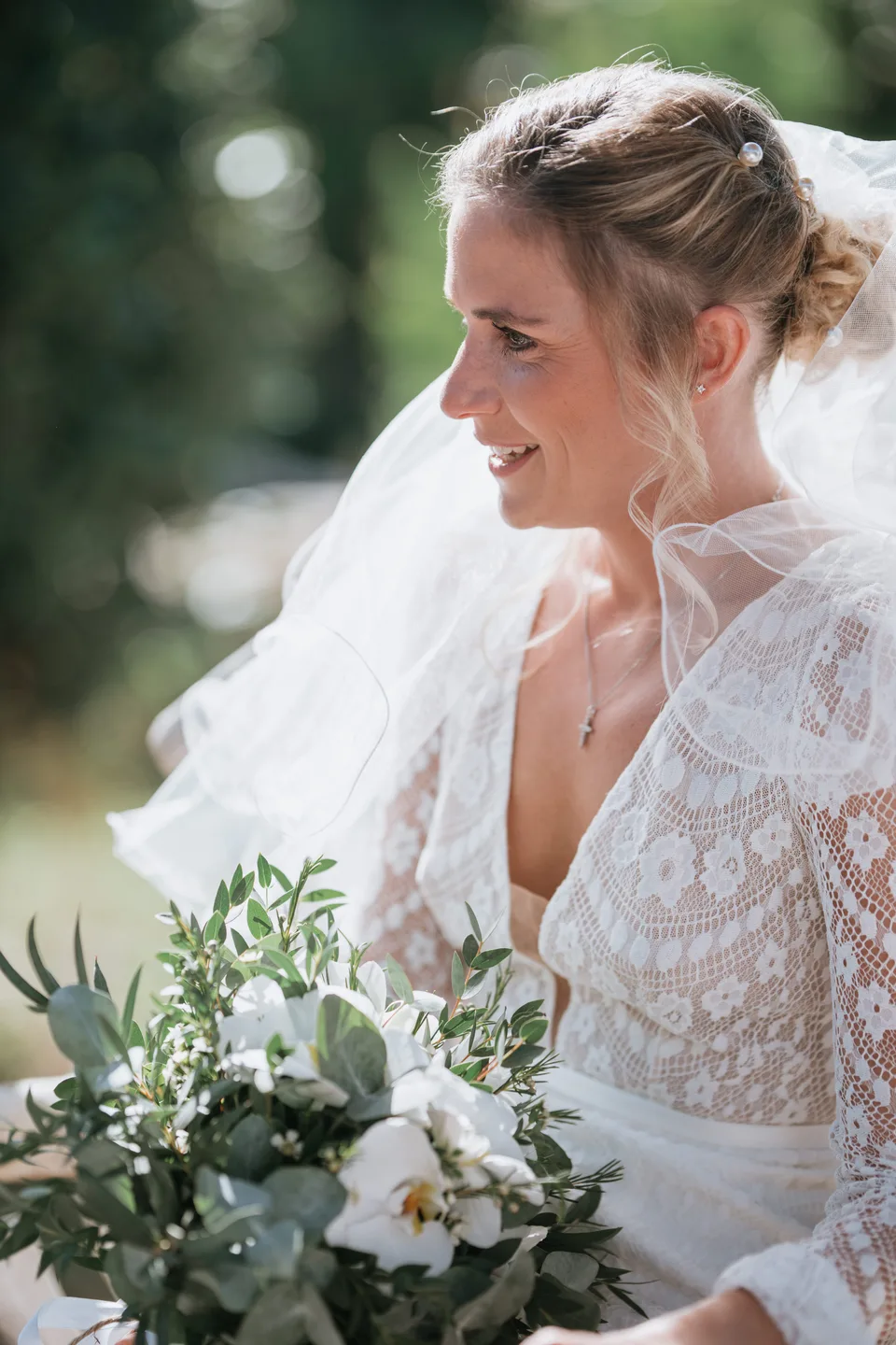 The bride smiling during the garden ceremony