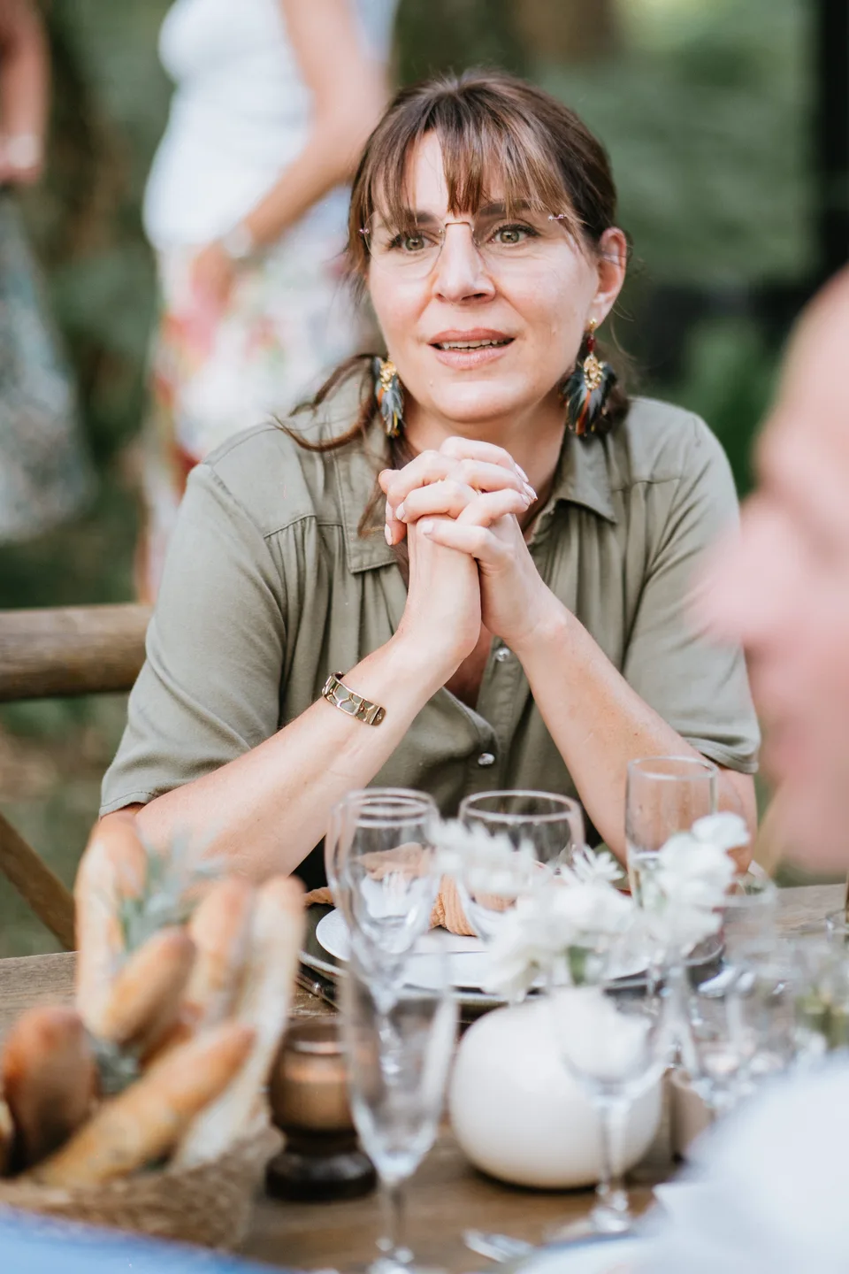 A guest listening at the reception table
