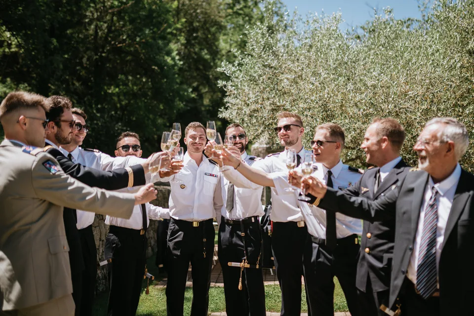 Guests gathered around drinks in the garden