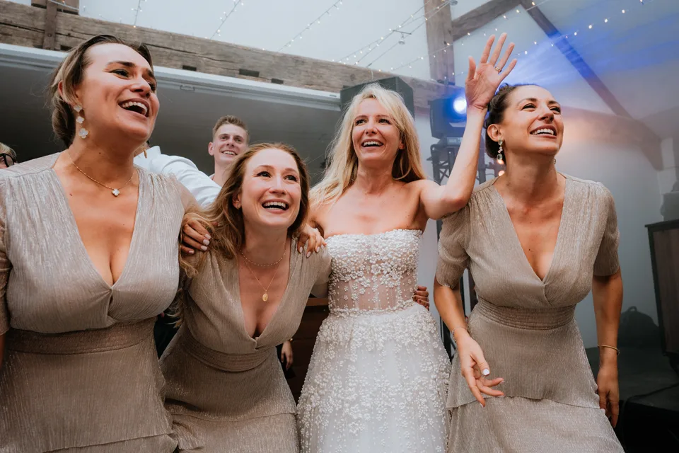 The bride and guests singing during the evening