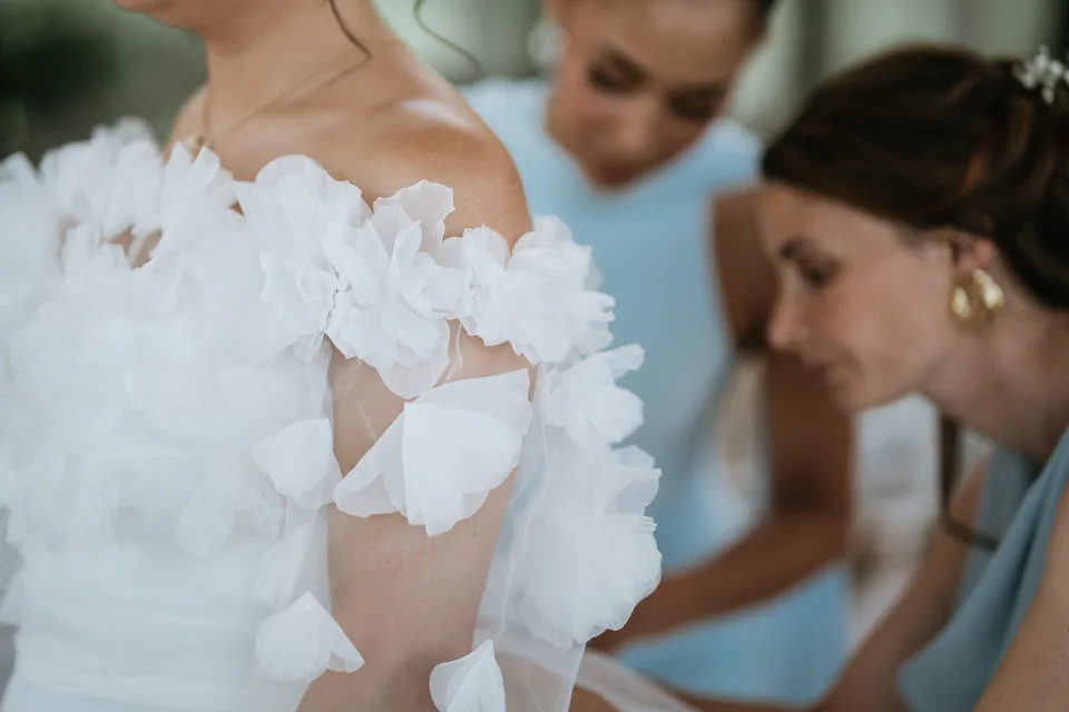 The final adjustments to the wedding dress