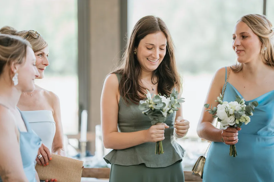 Loved ones talking to the bride before the ceremony
