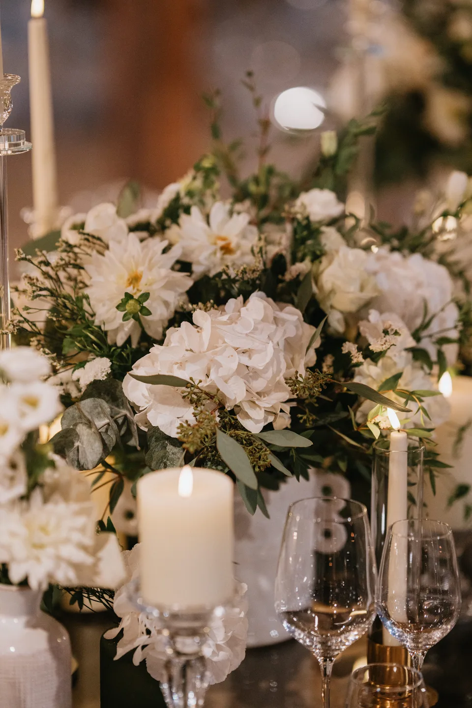Flowers and candles on a reception table