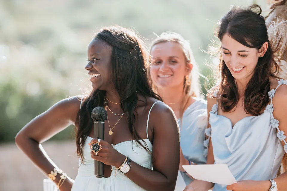 Three guests listening during the ceremony