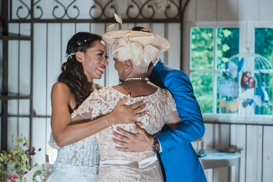 The bride embracing a guest