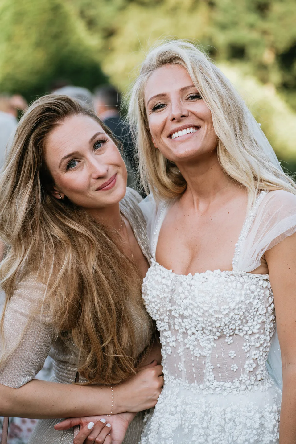 The bride and a guest together