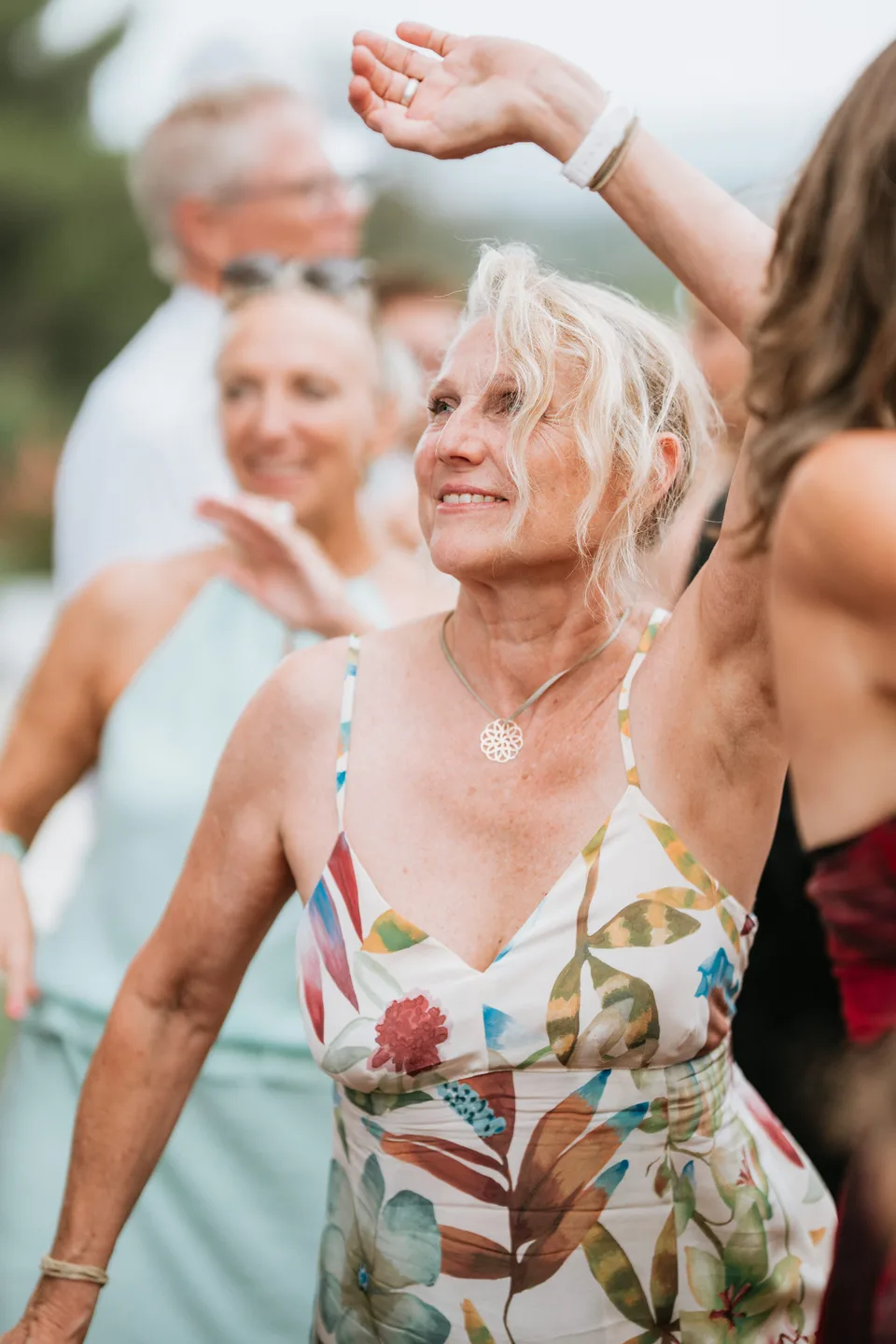 A guest laughing at the reception